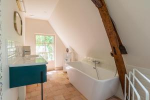 Appartements T3 Duplex dependance du Chateau : photos des chambres
