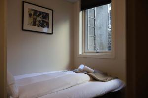 Dinbnb Apartments I Charming 3-Bedroom in the Heart of the City
