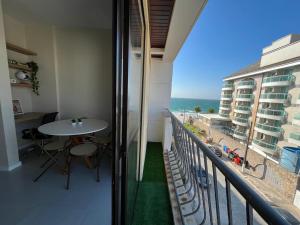 Apartamento aconchegante com vista para o mar
