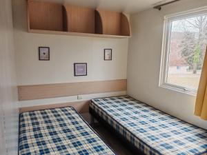 Campings Camping de Ladignac Le Long Bel air : photos des chambres