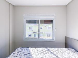 Apto de 2 dormitórios em na praia de Palmas - 0446