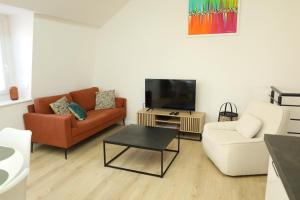Appartements Le Castelnau : photos des chambres