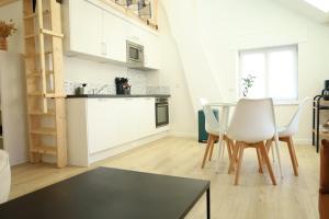 Appartements Le Castelnau : photos des chambres