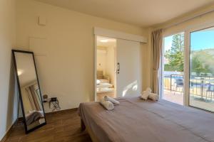 Danaos Seaside Suite 002 with Pool in Tourist Area