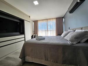 Studio espaçoso e confortável a 50m da praia