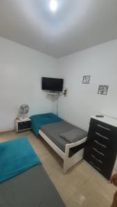 Meu Lugar de descanso à 250 metros da praia, piscina, churrasqueira