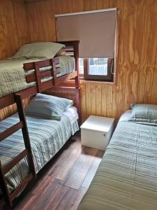 Borde Rio Coyhaique Cabaña y Tinaja