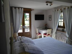 B&B / Chambres d'hotes La Griotte & Spa&Piscine : photos des chambres