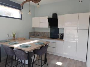 Appartements Appartement au Somail : photos des chambres