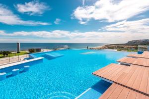 Infinity View luxury beachfront apartment pool&jacuzzi