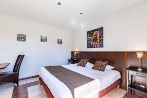 Hotels Logis Hotel L'Oliveraie : photos des chambres