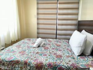 Two-Bedroom AE One Oasis Condominium - Behind SM Ecoland