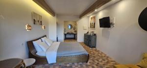 B&B / Chambres d'hotes L Amourier chambres charme et confort avec Jacuzzi ou baignoire XXL : photos des chambres