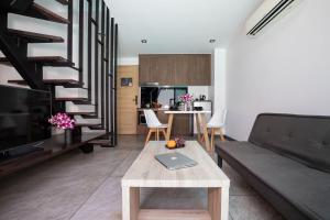 Poolside Duplex In Nai harn UTL A102