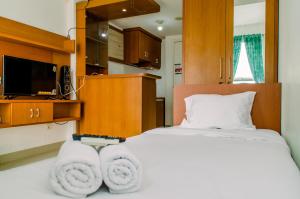 Cozy and Comfort Studio Room at Poris 88 Apartment By Travelio