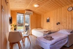 Zacisze obok Suntago Park noclegi 2 3 6 osobowe domki