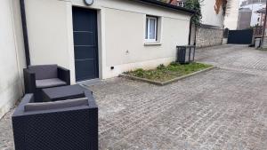Appartements Maison Fair play, jardin, parking, billard : photos des chambres