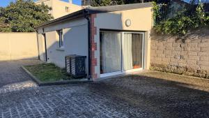 Appartements Maison Fair play, jardin, parking, billard : photos des chambres