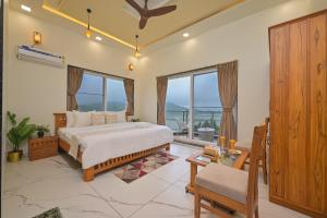SaffronStays Zeel by the Lake - 4BR lakefront pool villa with gazebo, games room & stunning Bhavali Dam views