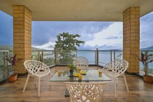 SaffronStays Zeel by the Lake - 4BR lakefront pool villa with gazebo, games room & stunning Bhavali Dam views