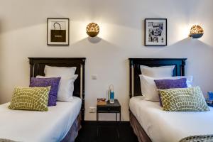 Appartements Sweet Inn - Paix : photos des chambres