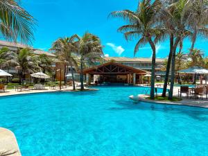 Porto das Dunas Apê na Areia com Banheira, lazer total e estrutura de praia para toda a Família