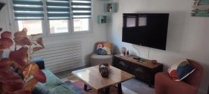 Appartements Au Bon Endroit - 4-6 pers : photos des chambres
