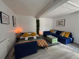 Maisons de vacances Le Troglogite Mignon - Maison et Jardin : photos des chambres
