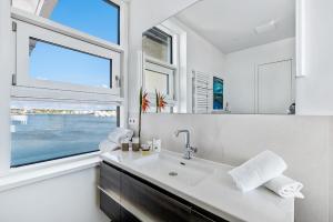 Sky Lodge - Exlusives Penthouse mit Panoramameerblick, Dachterrasse und Kamin