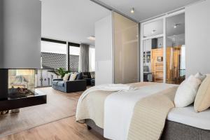 Heimathafen 1 Luxusferienwohnung in erster Reihe direkt am Strand mit Sauna und Kamin