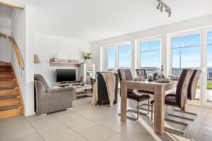 Beach House - Sonnenterasse, Wellnessbad mit Sauna, Kamin, Dachterrasse, Hafenblick