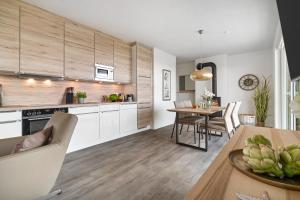 BeachWaveThree- 2OG, barrierearm, Meerblick, Balkon, Kamin, Sauna