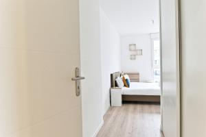 Appartements Spacieux 3 chambres avec balcon : photos des chambres