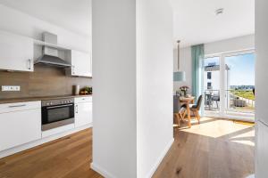 Ocean Place- 3 OG, Balkon, Blick ins Gruene, Kamin