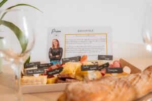 Appartements Le cosy Memorial - Parking - BY PRIMO CONClERGERIE : photos des chambres