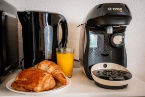 Appartements Le cosy Memorial - Parking - BY PRIMO CONClERGERIE : photos des chambres