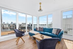 5 Beaufort - Wasserhaus, Meerblick, Sauna, Dachterrasse, Bootsanleger, Strandkorb
