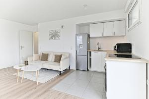Appartements Spacieux 3 chambres avec balcon : photos des chambres