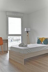 Appartements Spacieux 3 chambres avec balcon : photos des chambres