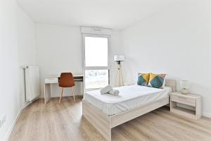 Appartements Spacieux 3 chambres avec balcon : photos des chambres