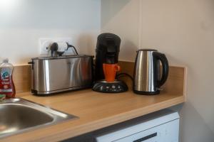 Appartements Chez Edgard et Ernest, balcon et parking : photos des chambres