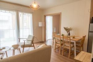 Appartements Chez Edgard et Ernest, balcon et parking : photos des chambres