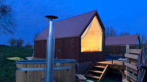 Maisons de vacances Cabane luxe & spa exterieur Les Magnolias : photos des chambres