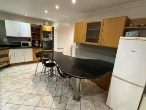 Maisons de vacances Large house near Parc des Expositions cdg : photos des chambres