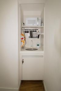 HOME IN RIO - Cinelândia (Apto novo com Wi-Fi)