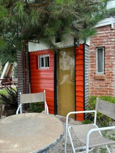 Tiny House con parrilla y jardín cerca del mar