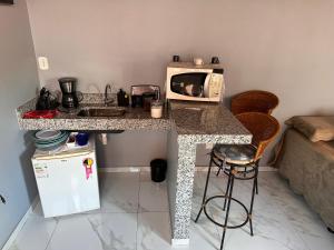 Suíte Tropical a 50 metros da Lagoa