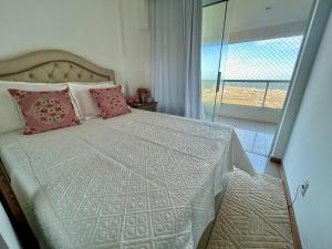 Varanda gourmet vista mar