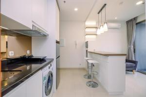 Stunning and Cozy 1BR Apartment at Ciputra World 2 By Travelio