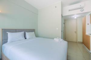 Functional and Minimalist Studio Apartment at Springlake Summarecon By Travelio